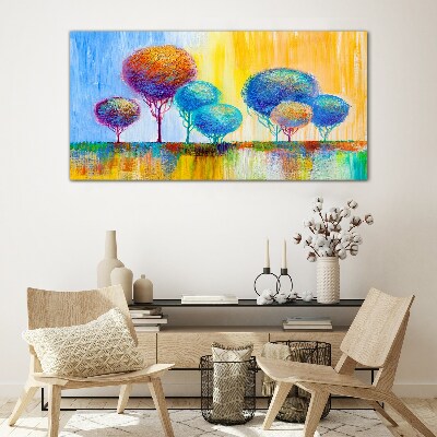 Colorful trees in the sunset light Glass Print