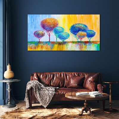 Colorful trees in the sunset light Glass Print