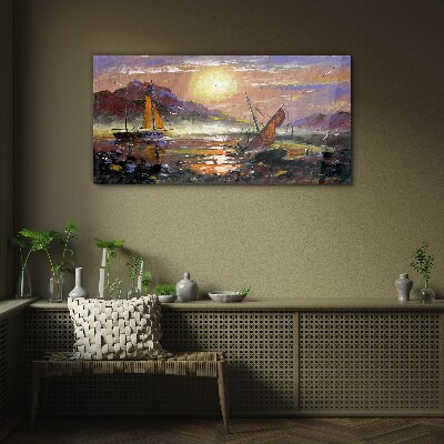 Sunset over the sea Glass Print