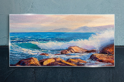 Waves on the coast at sunset Glass Print