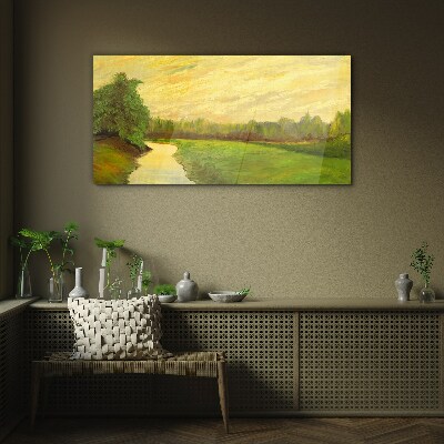 A peaceful landscape with a river and trees Glass Print