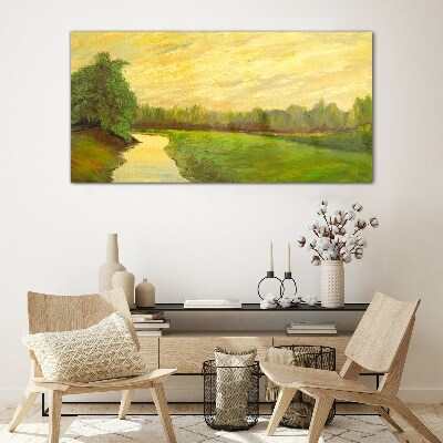 A peaceful landscape with a river and trees Glass Print