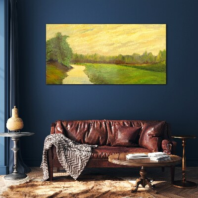 A peaceful landscape with a river and trees Glass Print