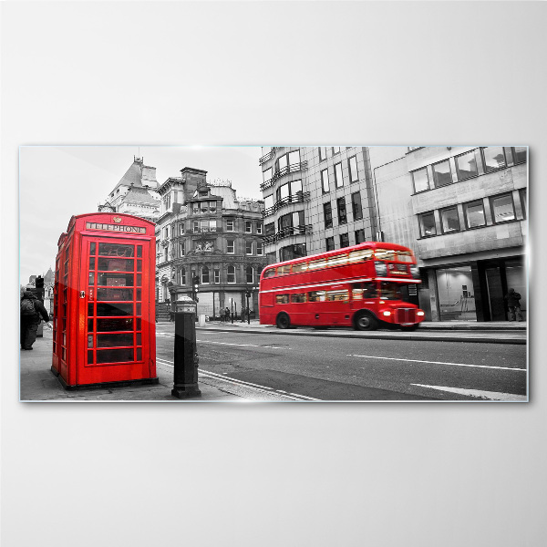 Red telephone in a grey city Glass Wall Art