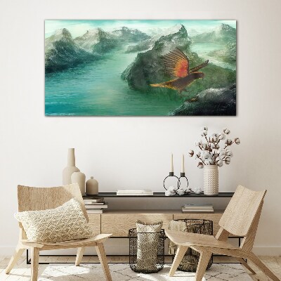 Eagle over a mountain lake Glass Print