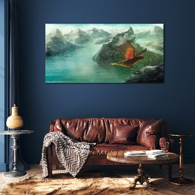 Eagle over a mountain lake Glass Print