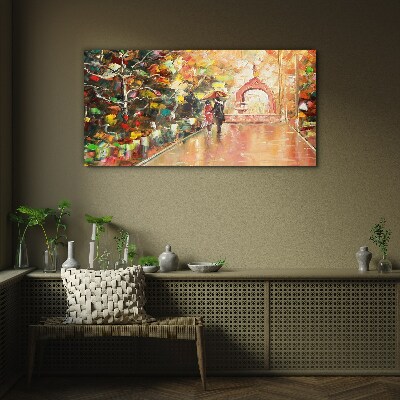 Autumn alley with umbrellas Glass Print