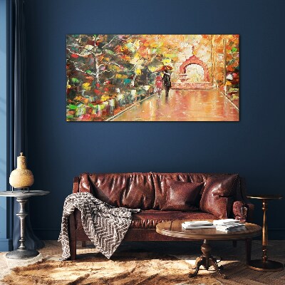 Autumn alley with umbrellas Glass Print
