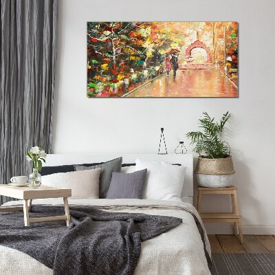 Autumn alley with umbrellas Glass Print