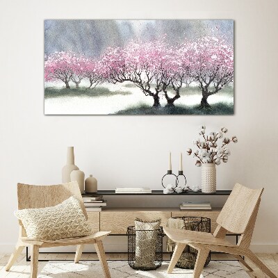 Blossoming trees in the spring haze Glass Print