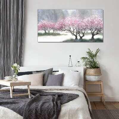 Blossoming trees in the spring haze Glass Print