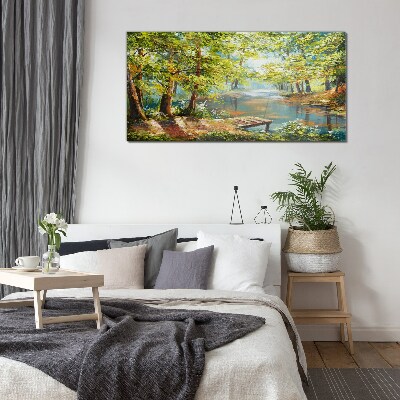 A peaceful forest landscape by the lake Glass Print