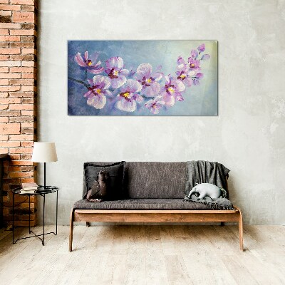 Floral orchids on blue background Glass Print