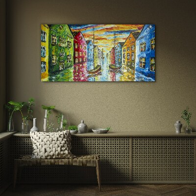 Colorful townhouses by the river Glass Print