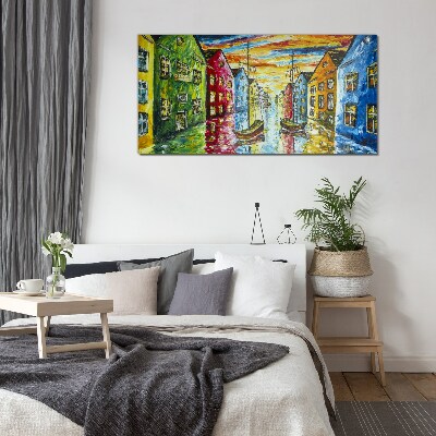 Colorful townhouses by the river Glass Print