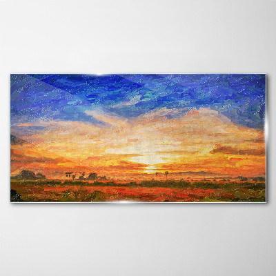 Sunset over a rural landscape Glass Print
