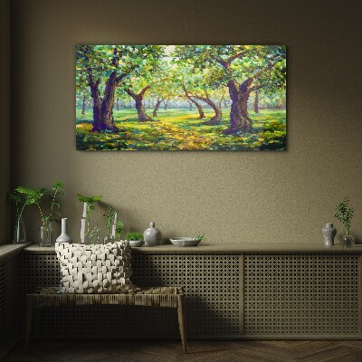 Green grove in the sun's rays Glass Print