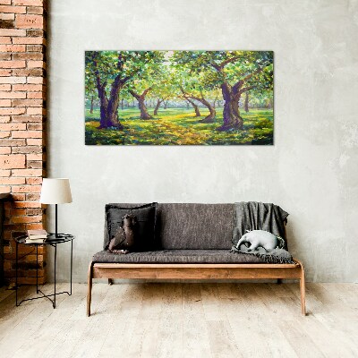 Green grove in the sun's rays Glass Print
