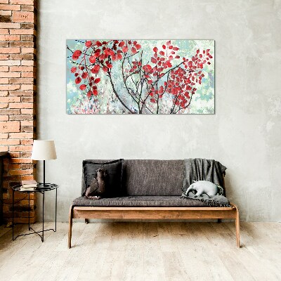 Red leaves on a blue background Glass Print