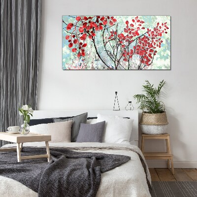 Red leaves on a blue background Glass Print