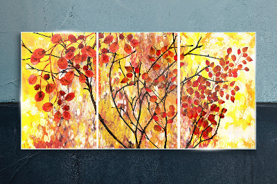 Autumn leaves on a yellow background Glass Print
