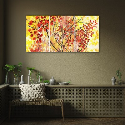 Autumn leaves on a yellow background Glass Print