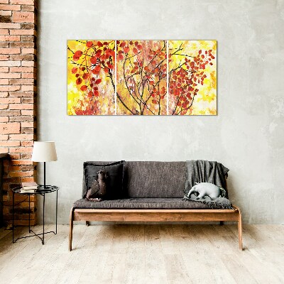 Autumn leaves on a yellow background Glass Print