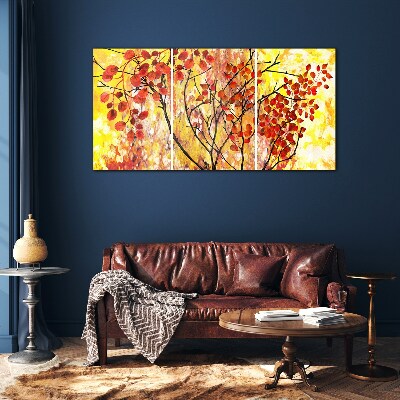 Autumn leaves on a yellow background Glass Print