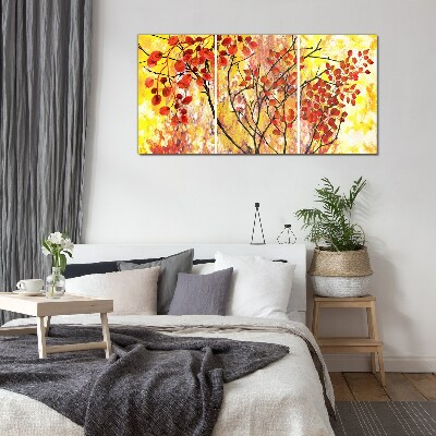 Autumn leaves on a yellow background Glass Print