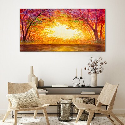 Sunset in a colorful forest Glass Print