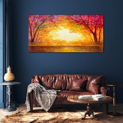 Sunset in a colorful forest Glass Print