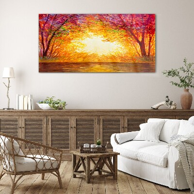 Sunset in a colorful forest Glass Print