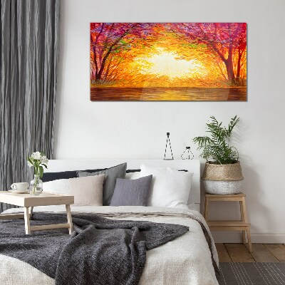 Sunset in a colorful forest Glass Print