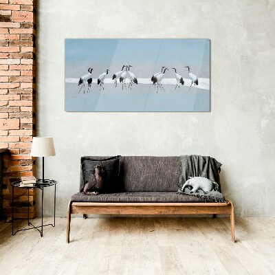 Flocks of cranes on a blue background Glass Wall Art