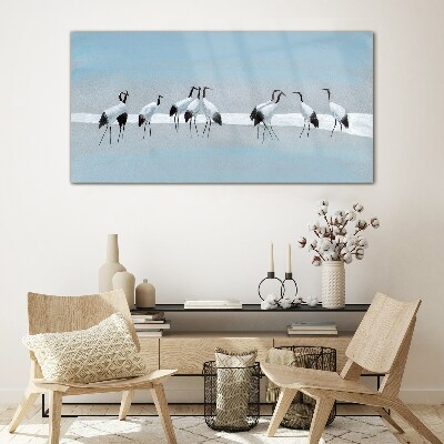 Flocks of cranes on a blue background Glass Wall Art