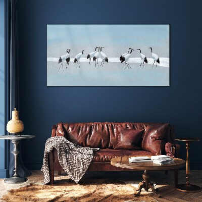 Flocks of cranes on a blue background Glass Wall Art
