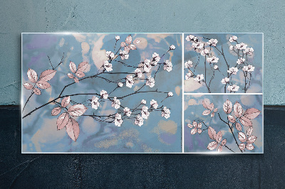 Floral branches on a blue background Glass Print