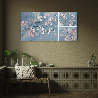 Floral branches on a blue background Glass Print