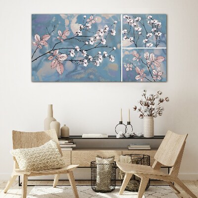 Floral branches on a blue background Glass Print