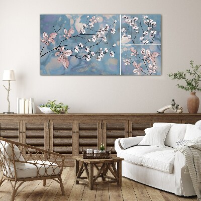 Floral branches on a blue background Glass Print