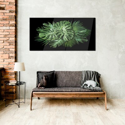 Tropical green on black background Glass Print