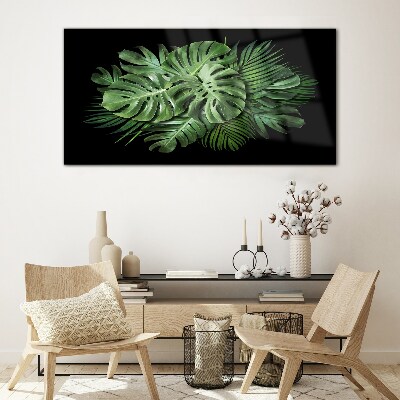 Tropical green on black background Glass Print