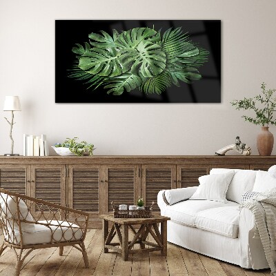 Tropical green on black background Glass Print