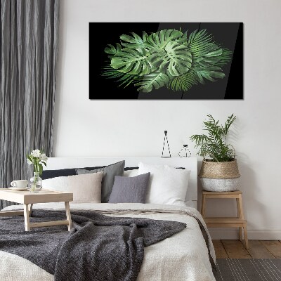 Tropical green on black background Glass Print