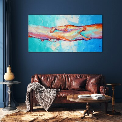 Uniting hands in color Glass Print