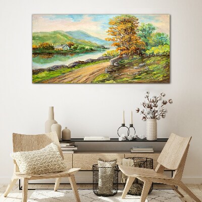 A peaceful landscape by the river Glass Print