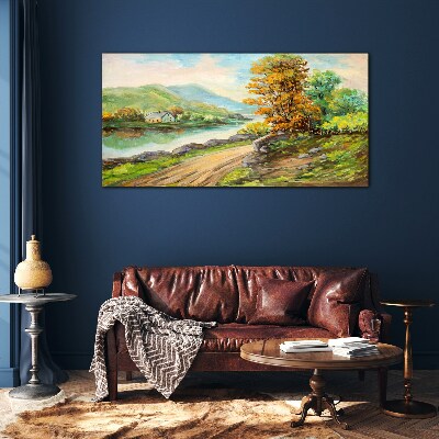 A peaceful landscape by the river Glass Print