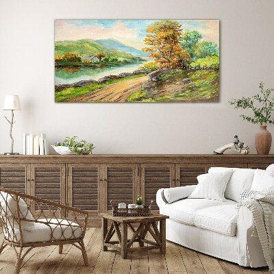 A peaceful landscape by the river Glass Print
