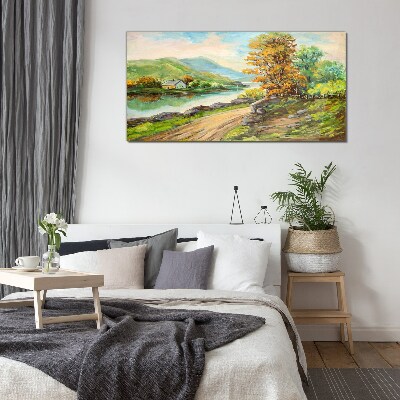 A peaceful landscape by the river Glass Print