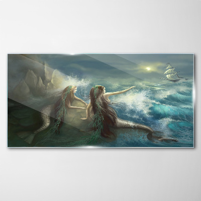 Mermaids on the seashore Glass Print